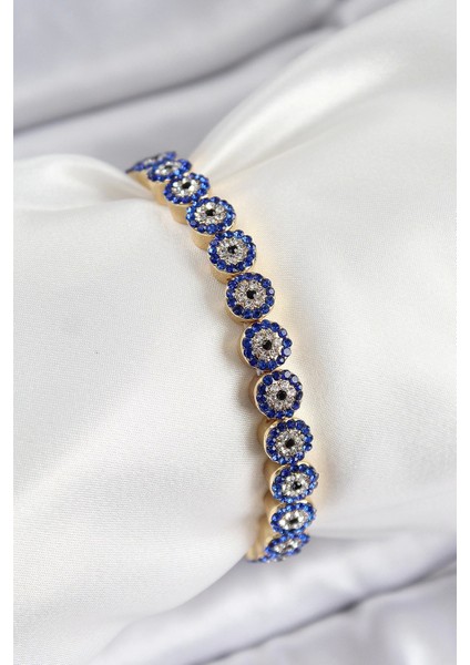 Pirinç Zirkon Taşlı Lacivert Nazar Model Gold Renk Lastikli Kadın Bileklik