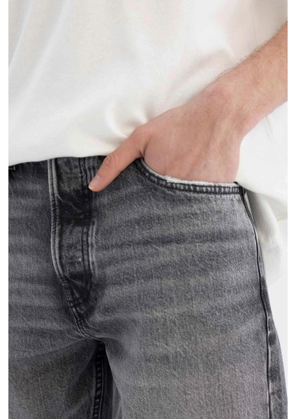 %100 Pamuk 90's Slim Fit Dar Kalıp Yüksek Bel Dar Paça Yırtık Detaylı Jean Pantolon C9829AX24SM indirimleri