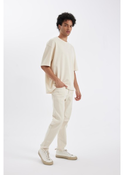 Slim Tapered Fit Dar Kalıp Normal Bel Daralan Paça Jean Pantolon C9743AX24AU fiyatları