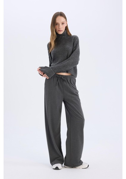 Afra x Defacto Coool Wide Leg Kumaş Pantolon Geniş Bol Paça Beli Lastikli Bağcıklı Cepli C1428AX25SP fırsatları