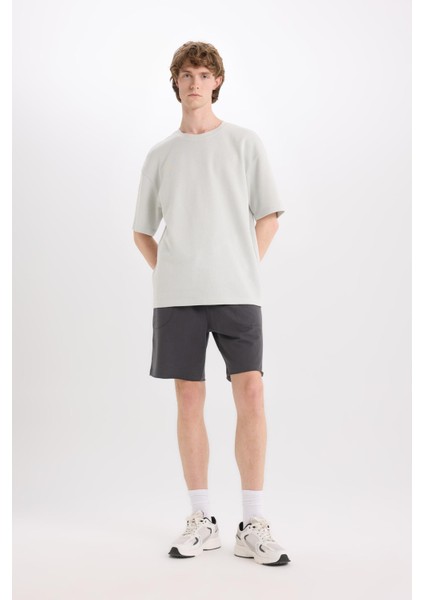 %100 Pamuk Slim Fit Dar Kesim Dar Paça Cepli Basic Düz Şort B8673AX25SM fiyatları