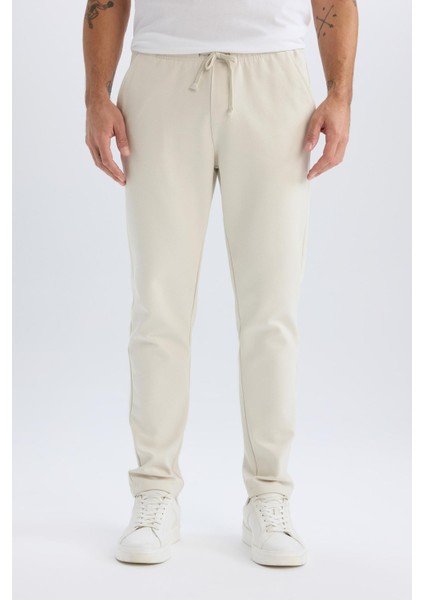 Jogger Pantolon Esnek Basic Düz Beli Bağcıklı Cepli Düz Paça C6022AX25SP fırsatları