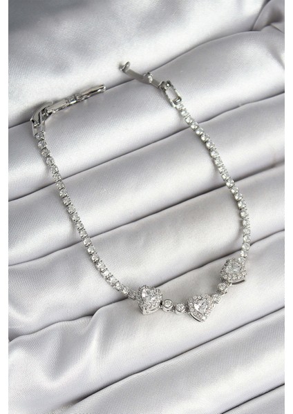 Pirinç Sıralı Kalp Figürlü Zirkon Taşlı Gümüş Renk Kadın Bileklik - Lisinya