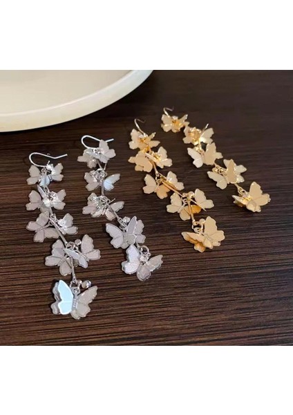 Şıklığınızı Tamamlayacak Taşlı Kelebek Küpe modelleri