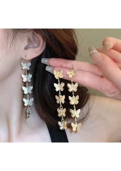 Şıklığınızı Tamamlayacak Taşlı Kelebek Küpe fırsatları