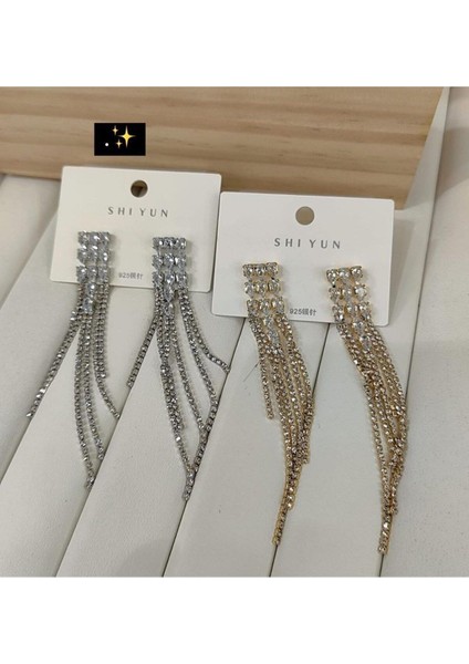 Şıklığınızı Tamamlayacak Işıltılı Zikron Taşlı Küpe modelleri