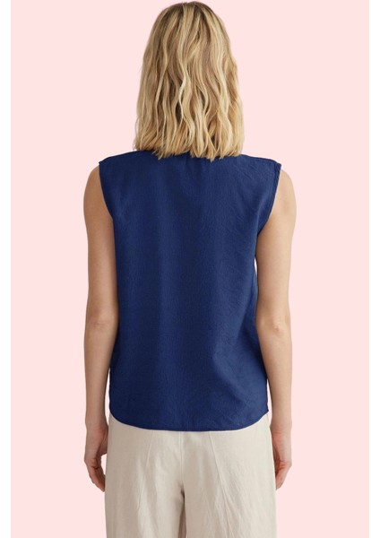 Kadın Keten Görünümlü Kolsuz Gömlek Düz Desen Regular Kalıp Yaz Aylarının Vazgeçilmezi Hafta Sonu modelleri