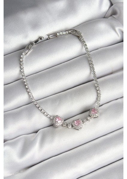 Pirinç Sıralı Pembe Kalp Figürlü Zirkon Taşlı Gümüş Renk Kadın Bileklik