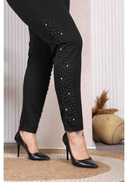 Taş Detaylı Dar Paça Pantolon fiyatları