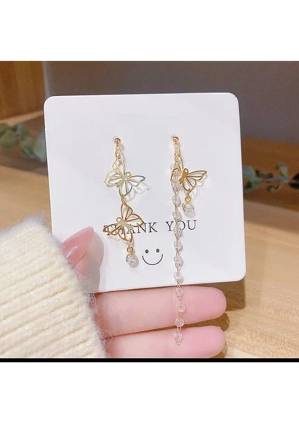 Zarif Taşlı Kelebek Küpe: Şıklığınızı Tamamlayın