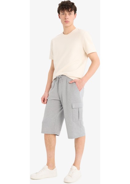 Slim Fit Dar Kesim Kargo Cepli Basic Düz Kapri Şort T4693AZ25SM fırsatları