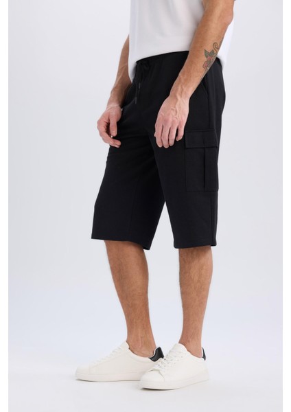 Slim Fit Dar Kesim Kargo Cepli Basic Düz Kapri Şort T4693AZ25SM fırsatları