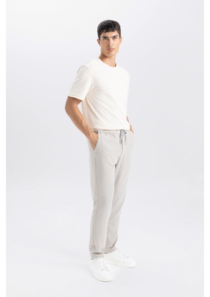 Yazlık Jogger Pantolon Slim Fit Dar Kesim Beli Bağcıklı Cepli Düz Paça D8638AX24AU modelleri