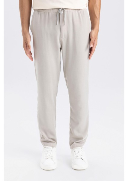 Yazlık Jogger Pantolon Slim Fit Dar Kesim Beli Bağcıklı Cepli Düz Paça D8638AX24AU indirimleri