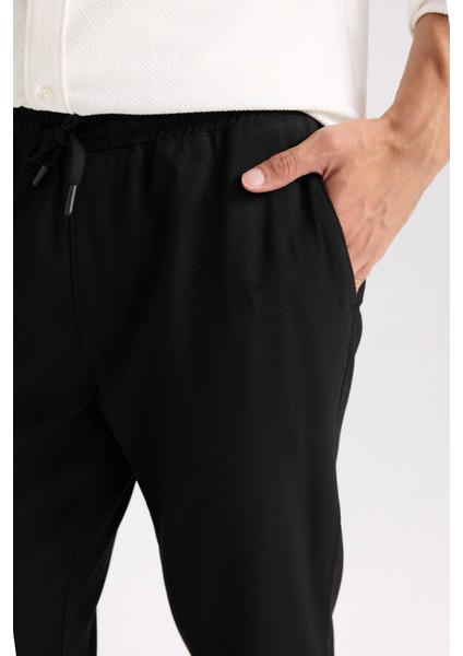Basic Düz Beli Lastikli Bağcıklı Cepli Jogger Düz Paça Siyah Pantolon D8640AX24AU indirimleri