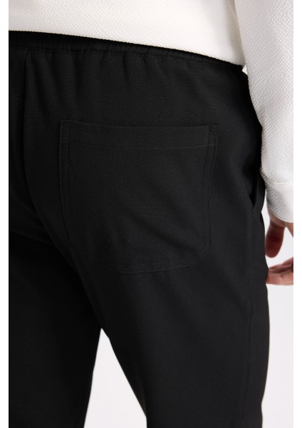 Basic Düz Beli Lastikli Bağcıklı Cepli Jogger Düz Paça Siyah Pantolon D8640AX24AU