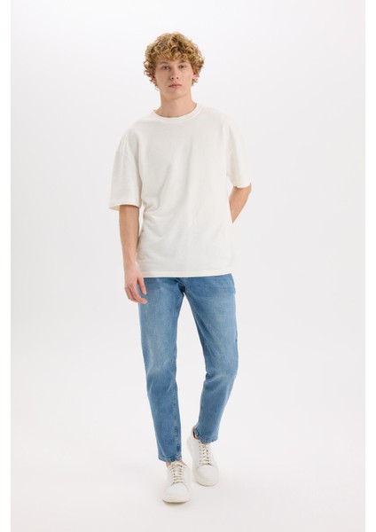 Slim Tapered Fit Dar Kalıp Normal Bel Daralan Paça Jean Pantolon D8745AX25SP fiyatları