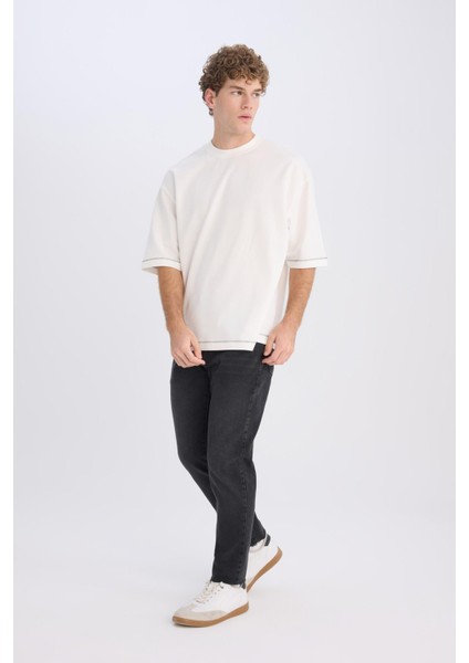 Slim Tapered Fit Dar Kalıp Normal Bel Daralan Paça Jean Pantolon D8748AX25SP fiyatları