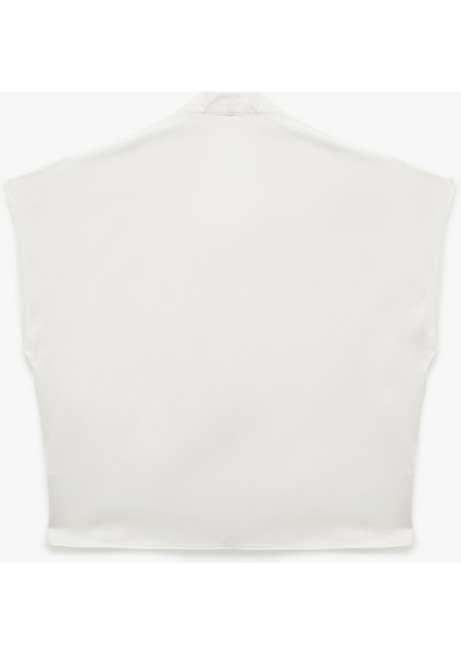 Regular Fit Dökümlü Drapeli Kolsuz Kruvaze Bluz fiyatları