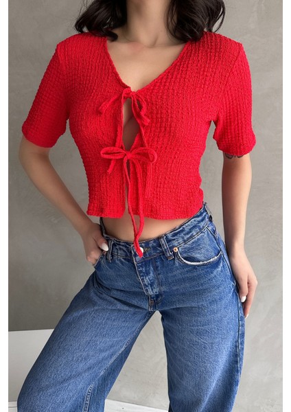 V Yaka Önü Bağlamalı Gofre Crop Bluz fırsatları