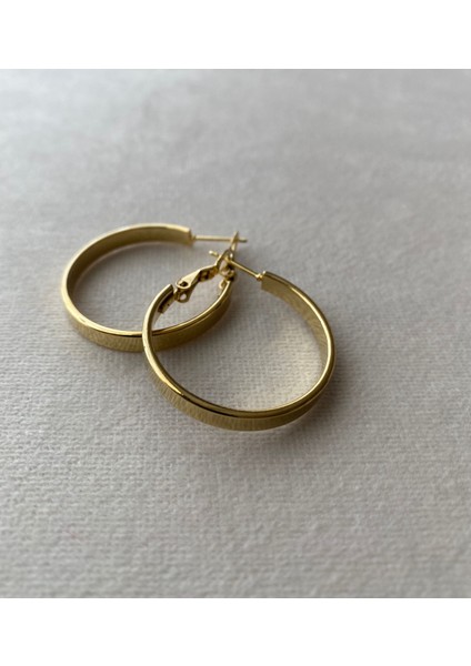 Kadın Oval Ajda Gold Renkli Çelik Küpe fırsatları