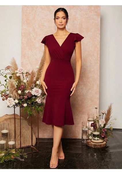 Kadın Kısa Kelebek Kollu Kruvaze Yaka Ithal Krep Midi Elbise modelleri
