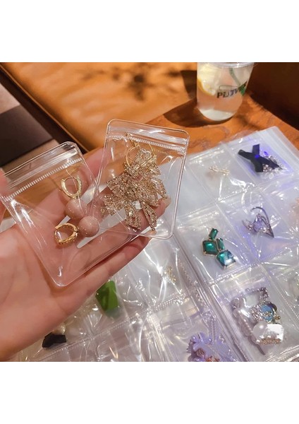 84-Grid Şeffaf Mücevher Saklama Kitabı ve 50 Adet Kalın Pvc Fermuarlı Kapatma Çantaları Seyahat Mücevher Küpe Vitrin Kutusu (Yurt Dışından) modelleri