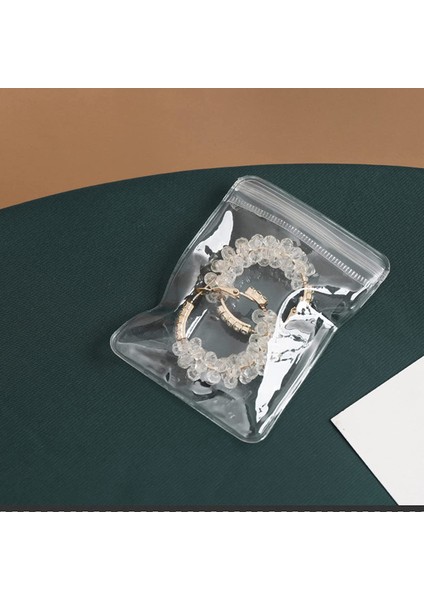 84-Grid Şeffaf Mücevher Saklama Kitabı ve 50 Adet Kalın Pvc Fermuarlı Kapatma Çantaları Seyahat Mücevher Küpe Vitrin Kutusu (Yurt Dışından) indirimleri