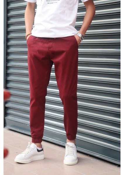 Bel ve paça lastikli, gabardin kumaş, bordo jogger pantolon fiyatları