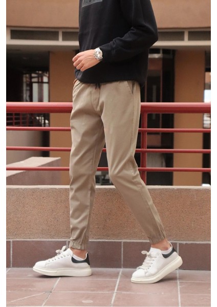 Bel ve paça lastikli, gabardin kumaş, taş jogger pantolon
