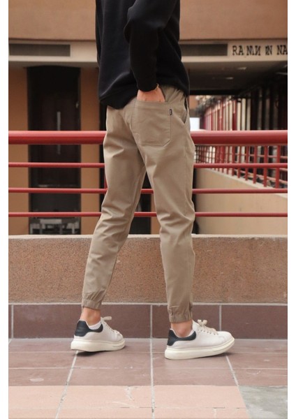 Bel ve paça lastikli, gabardin kumaş, taş jogger pantolon fiyatları