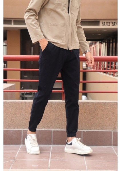 Bel ve paça lastikli, gabardin kumaş, lacivert jogger pantolon fiyatları
