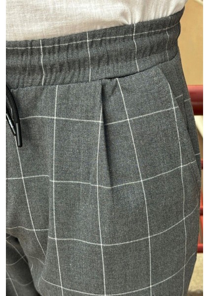 Erkek, bel bağcıklı, ekose desenli, Esnek kumaş, Pile detaylı, Jogger pantolon 24INP199K indirimleri