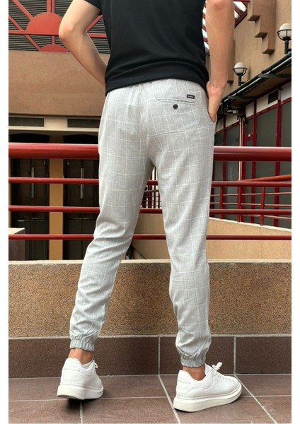 Erkek, bel bağcıklı, ekose desenli, Esnek kumaş, Pile detaylı, Jogger pantolon 24INP199K fırsatları