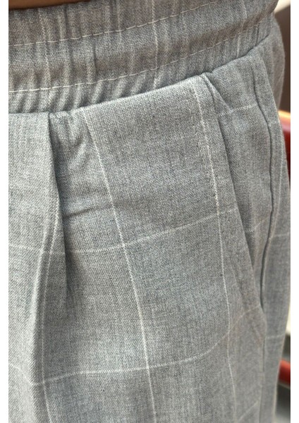 Erkek, bel bağcıklı, ekose desenli, Esnek kumaş, Pile detaylı, Jogger pantolon 24INP199K indirimleri