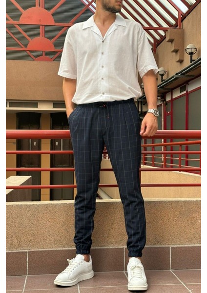Erkek, bel bağcıklı, ekose desenli, Esnek kumaş, Pile detaylı, Jogger pantolon 24INP199K fırsatları
