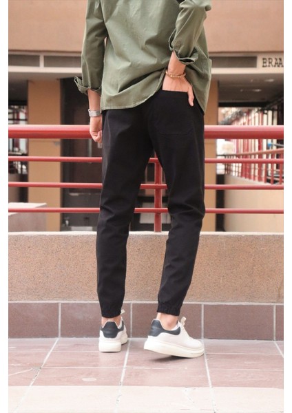 Bel ve paça lastikli, gabardin kumaş, siyah jogger pantolon fiyatları