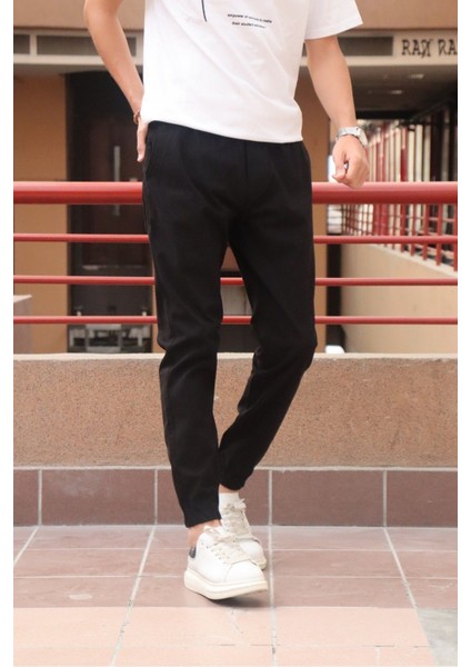 Bel ve paça lastikli, gabardin kumaş, siyah jogger pantolon fırsatları