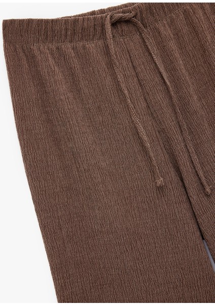 Bürümcük Kumaş Rahat Kalıp Beli Bağcıklı Düz Bol Paça Pantolon modelleri