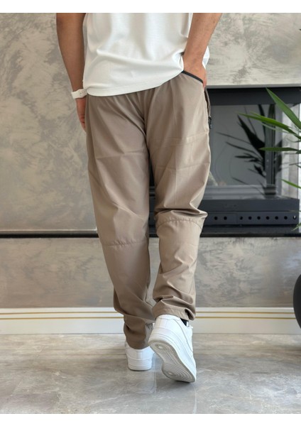 Erkek Rahat Kalıp Fermuar Detaylı Paraşüt Kumaş Pantolon Bej ECA024 fırsatları