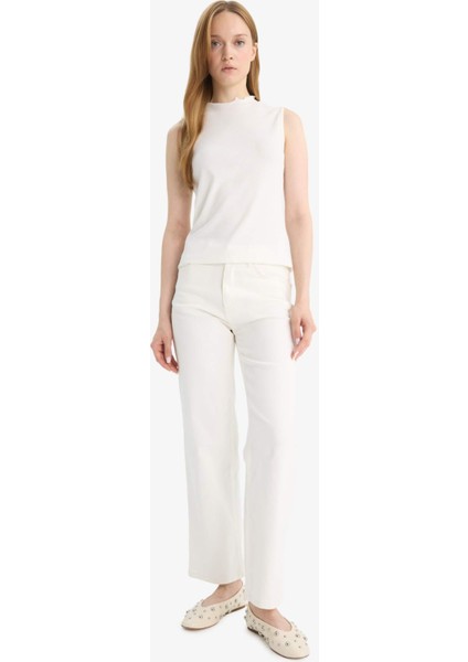 Slim Fit Dar Kesim Yarım Balıkçı Yaka Fitilli Kaşkorse Kolsuz Tunik G0050AX25HS fiyatları