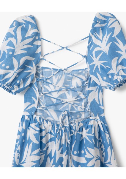 Pamuklu Kısa Balon Kollu Arkası Dekolte Detaylı Midi Boy Çiçekli Elbise indirimleri