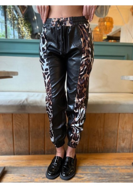 Kadın Bel ve Paça Lastikli Detay Yanları Leopar Detay Bağcıklı Deri Pantolon modelleri
