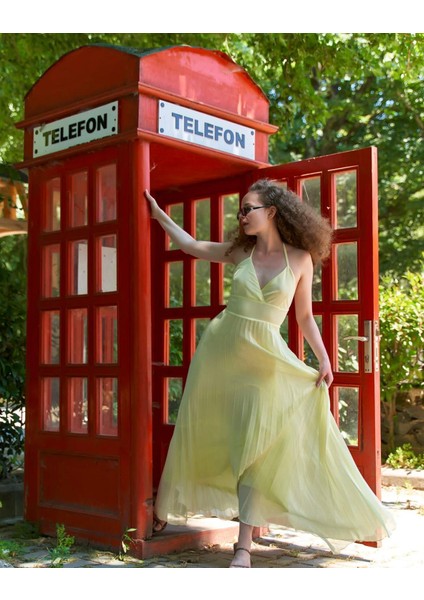 Piliseli Sırt Detaylı Astarlı Sırt Kısmı Lastikli Pileli Sarı Elbise modelleri