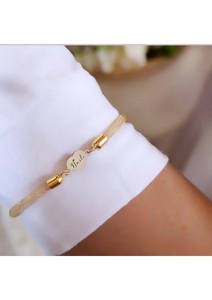 Altın Plakalı 14 Ayar Nazlı Ismine Özel Hasır Kordonlu Kalp Motifli Hediye BILEKLIK-474ISIM fiyatları