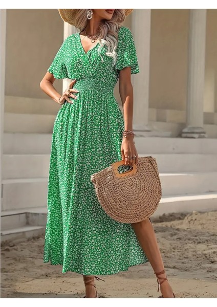 Kadın Kısa Kollu Kruvaze Yaka Beli Lastikli Yanlardan Yırtmaçlı Uzun Çiçekli Elbise indirimleri