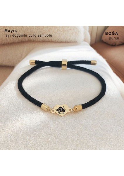 Altın Plakalı 14 Ayar Boğa Burçlarına Özel Kalp Figürlü Siyah Örgü Ipli Hediye BILEKLIK-475BURÇ fiyatları