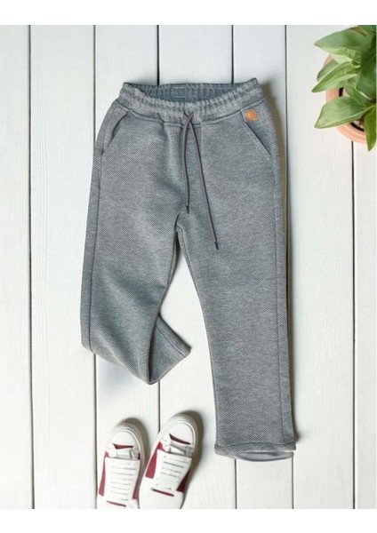 Lastikli Kendinden Dokulu Pantolon Gri