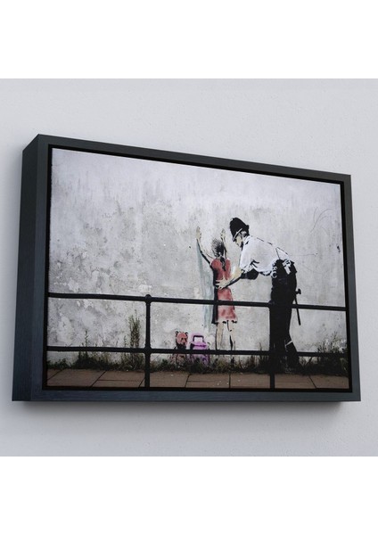 Beyaz Çerçeveli Bansky'nin Küçük Kız Çocuğunu Arayan Polis Isimli Çalışması Kanvas Tablo fırsatları