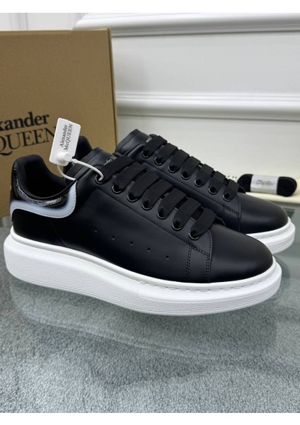 Oversize Siyah Deri Sneaker – Modern Şıklığın ve Konforun Güçlü Buluşması fiyatları